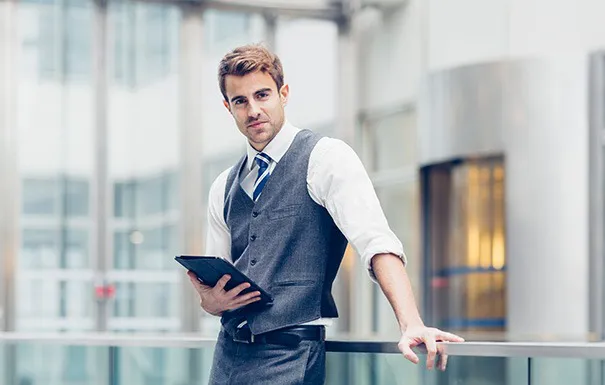 man-using-tablet.jpg man using tablet.jpg
